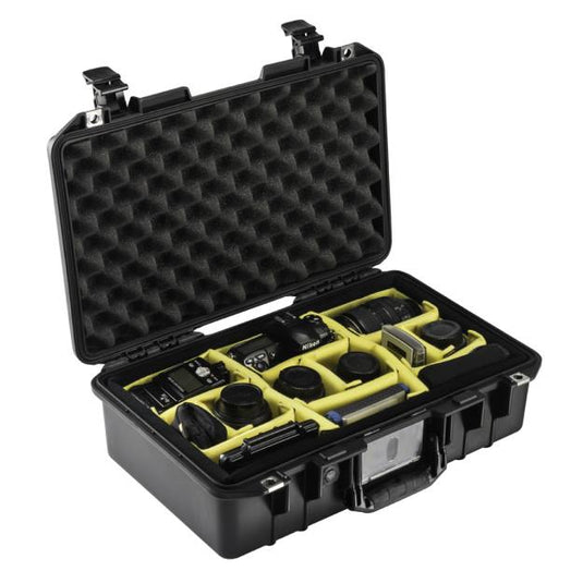 A black Pelican 1485 Air Camera Case open showing different camera pieces fitting into the customizable padded divider slots.