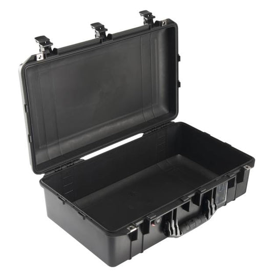 A black Pelican 1555 Air Case open with no foam inside.