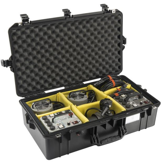 A black Pelican 1605 Air Camera Case open with camera equipment in the padded divider slots.