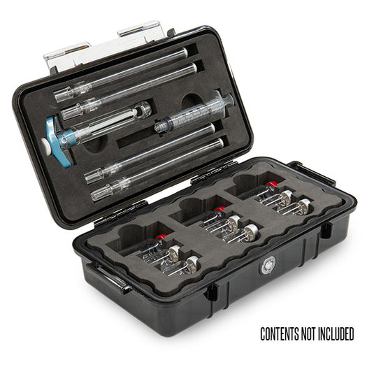 A black Pelican 1060 micro case with custom foam inside, showing a precut custom foam for medical equipment, with syringes and other items placed securely in their slots.