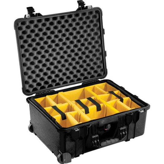 A black Pelican 1564 camera case with yellow padded dividers inside and foam lining the lid.