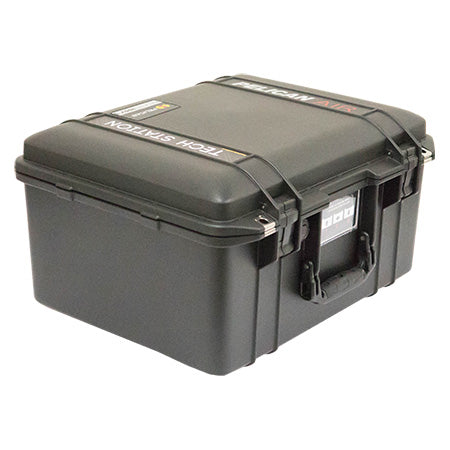 A black Pelican 1557 Air case closed, showing its handle and business card holder.