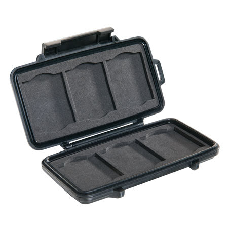 A black Pelican 0940 compact flash memory-card protector case open showing the precut foam.