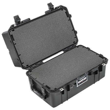 A black Pelican 1465 Air Case, open with a foam interior.