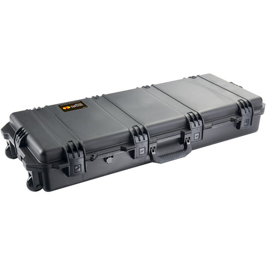 A black iM3100 Storm Rifle Case closed, showing its exterior handles, latches, and wheels.